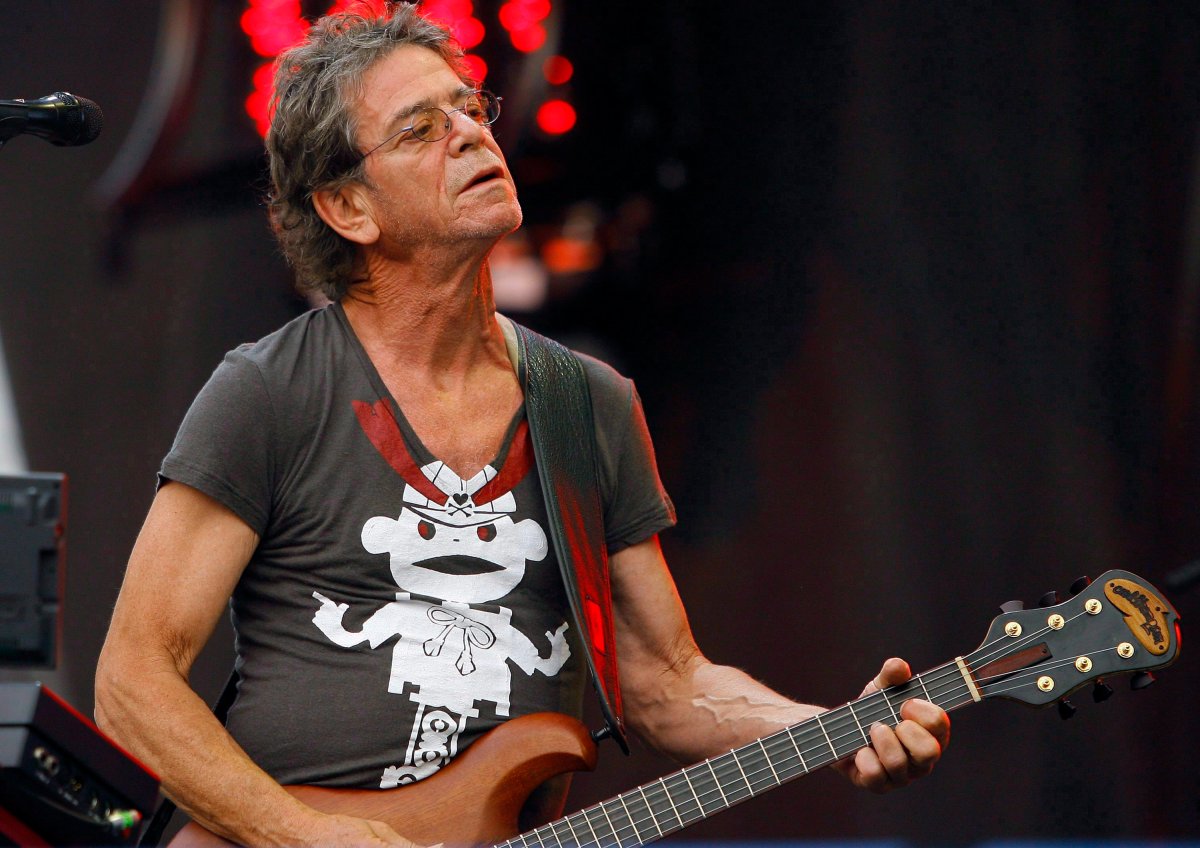 In this Sunday, Aug. 9, 2009 file photo, Lou Reed performs at the Lollapalooza music festival, in Chicago.  