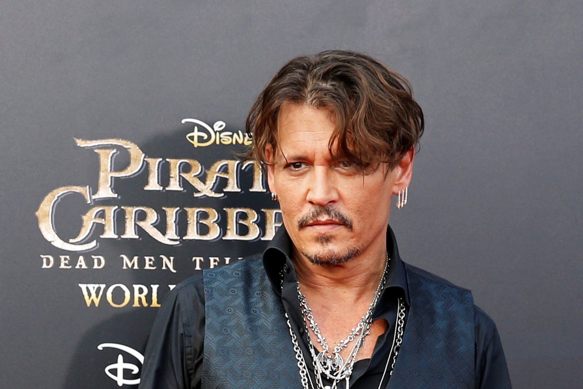 Actor Johnny Depp arrives on the red carpet for the global premiere of the film "Pirates of the Caribbean: Dead Men Tell No Tales", in Shanghai, China.