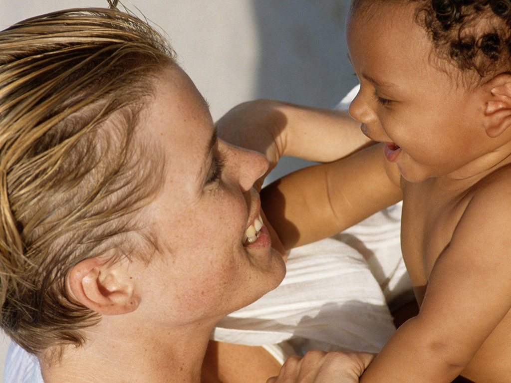 An adoptive mother took to Reddit to decry a woman who claimed she wasn't a 'real mom.' .