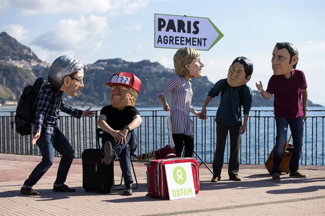 Oxfam activists stage a demonstration near the vebue of last month's G7 summit. From left: Italian Premier Paolo Gentiloni, U.S. President Donald Trump, German Chancellor Angela Merkel, Japanese Prime Minister Shinzo Abe and French President Emmanuel Macron.