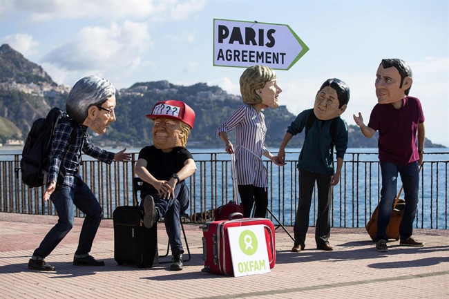 Oxfam activists stage a demonstration near the vebue of last month's G7 summit. From left: Italian Premier Paolo Gentiloni, U.S. President Donald Trump, German Chancellor Angela Merkel, Japanese Prime Minister Shinzo Abe and French President Emmanuel Macron.
