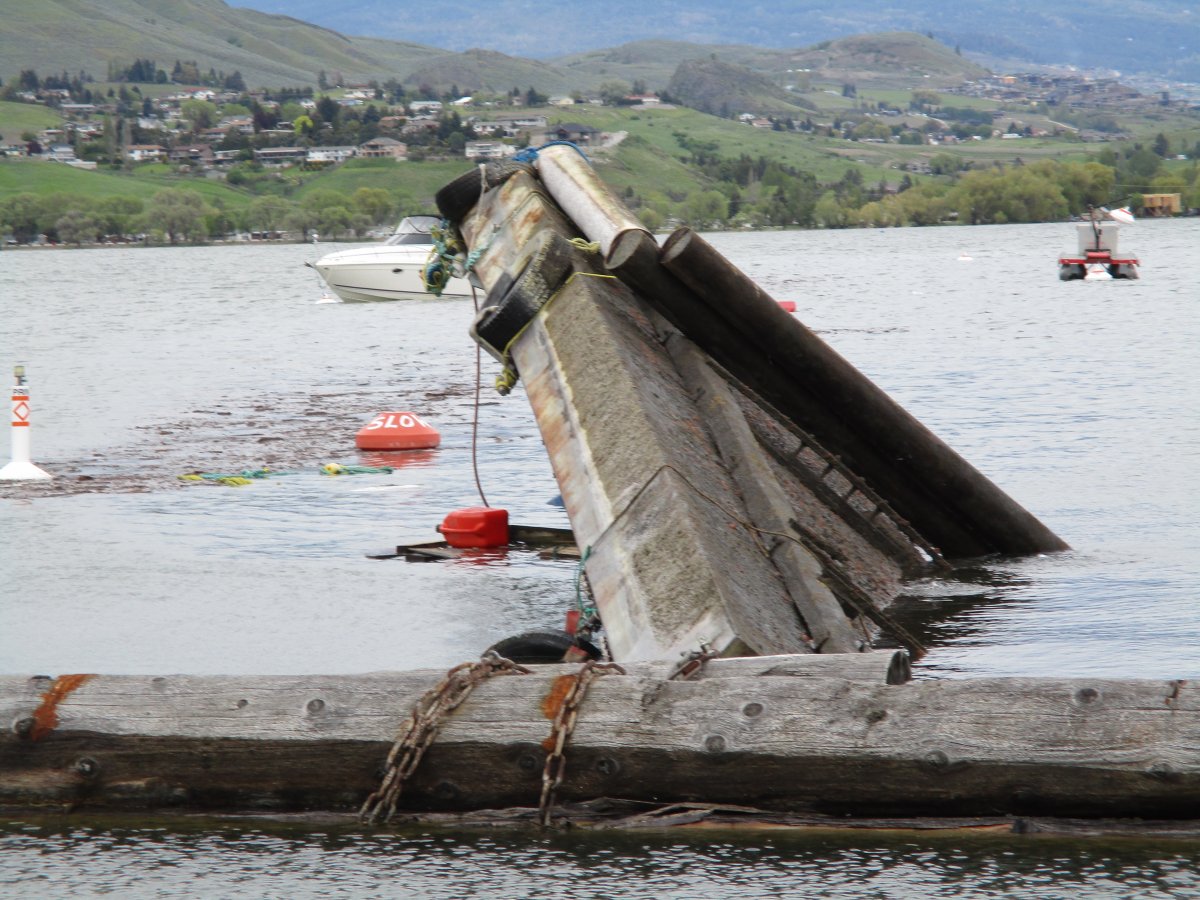 Sinking barge in Okanagan Lake - image