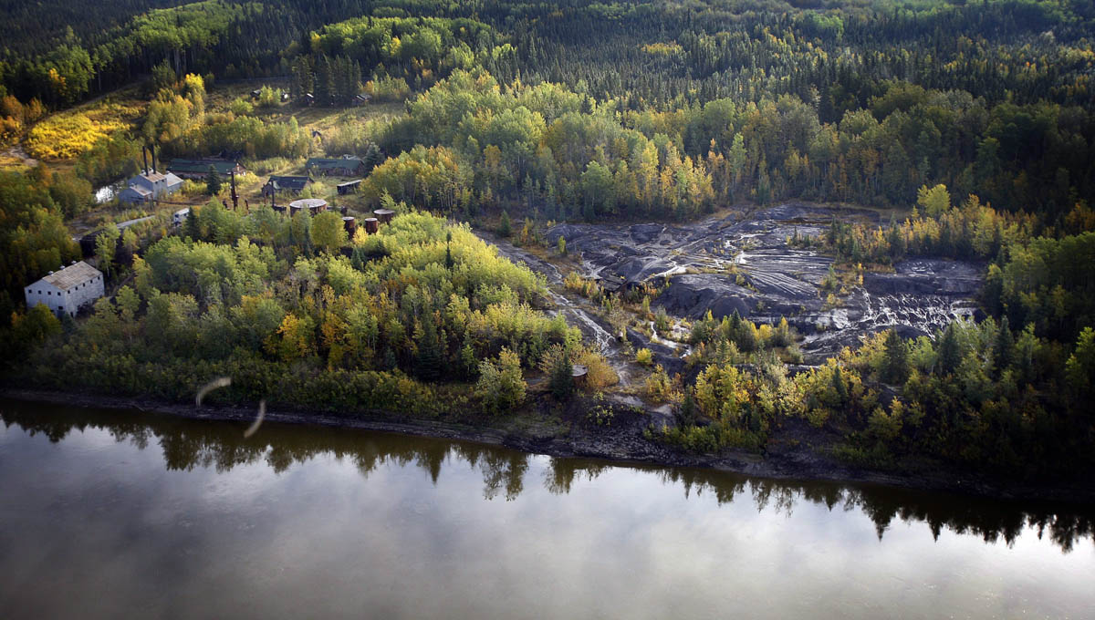 Alberta’s first oilsands operation (called Bitumont) on the shore of Athabasca River, is seen from the air near Fort McMurray, Alta., Monday, Sept. 19, 2011. THE CANADIAN PRESS/Jeff McIntosh