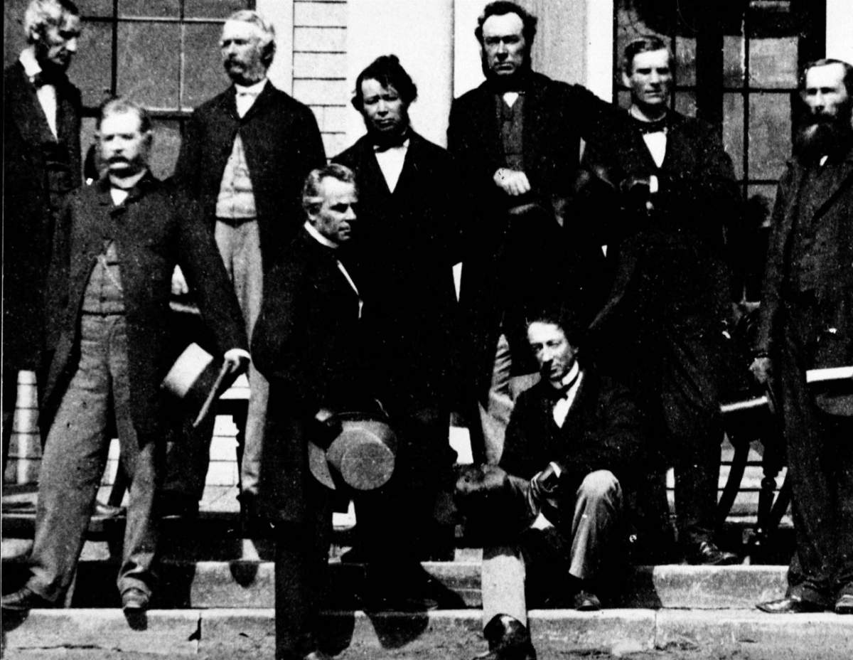 Charlottetown Prince Edward Island Sept. 1864 Historical Events – Several of the Fathers of Confederation photographed at the Charlottetown Conference in Sept. 1864 where they had gathered to consider the union of the British North American Colonies. Sir John A. Macdonald and Georges Etienne Cartier are in the foreground (National Archives of Canada)