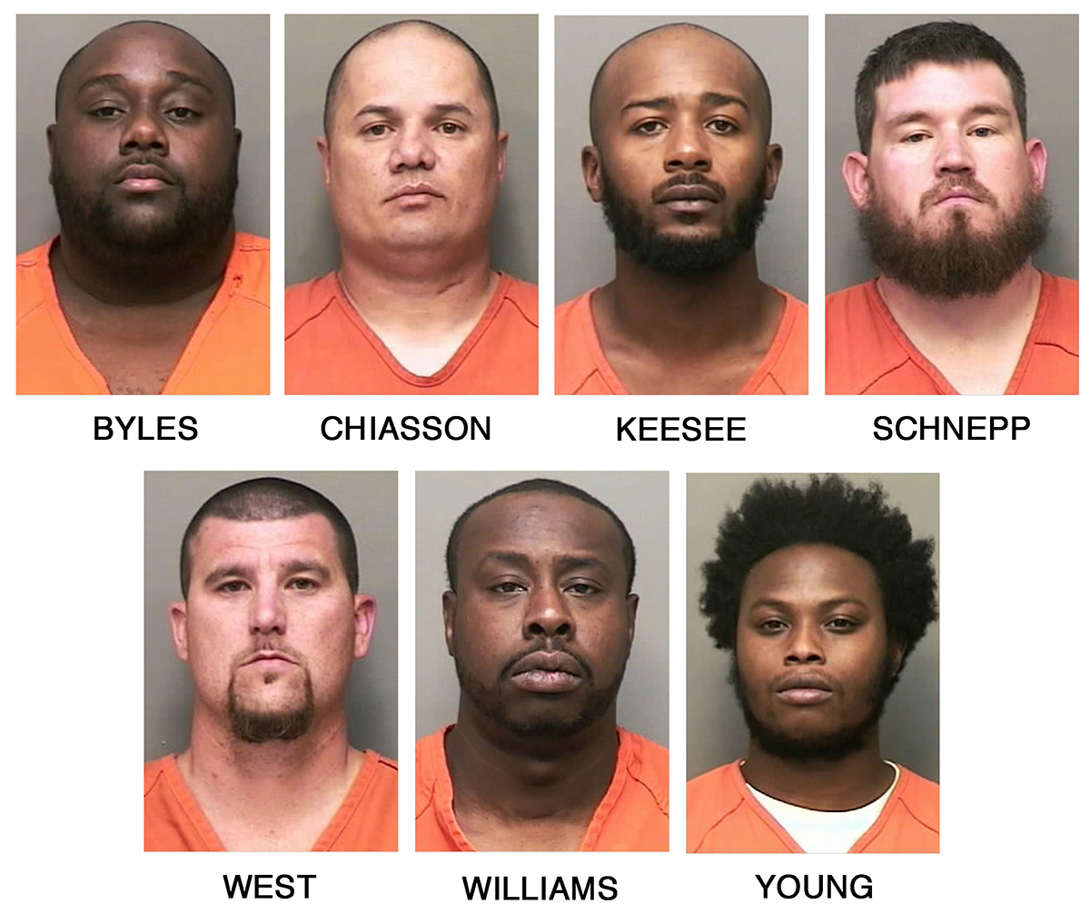This combo of booking photos released by the Clarksville, Tenn., Police Department shows, top row from left, William L. Byles, Kenneth Chiasson, Antwon D. Keesee and Jonathan Schnepp; bottom row from left, Roger D. West, Prentice L. Williams and Joshua Young. 