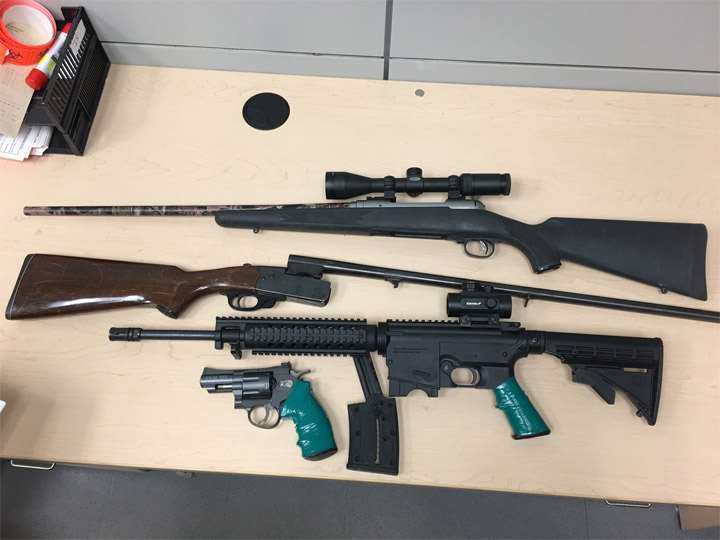 Guns seized by police at a Brandon, Man., home. Two Saskatoon men are facing charges after a police chase and raid in the western Manitoba city.
