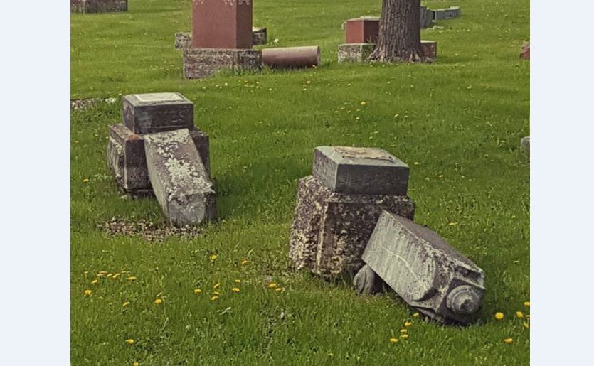 West End resident John LaPorte said he saw close to 100 headstones vandalized in some way.