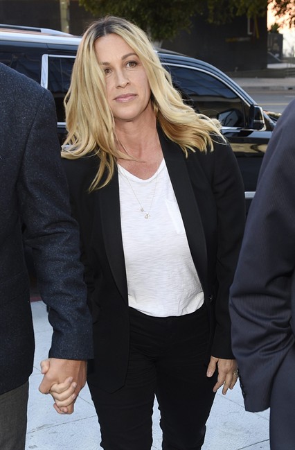 Singer Alanis Morissette arrives at U.S. federal court for the sentencing in the embezzlement case of her former manager Jonathan Todd Schwartz, Wednesday, May 3, 2017, in Los Angeles. 