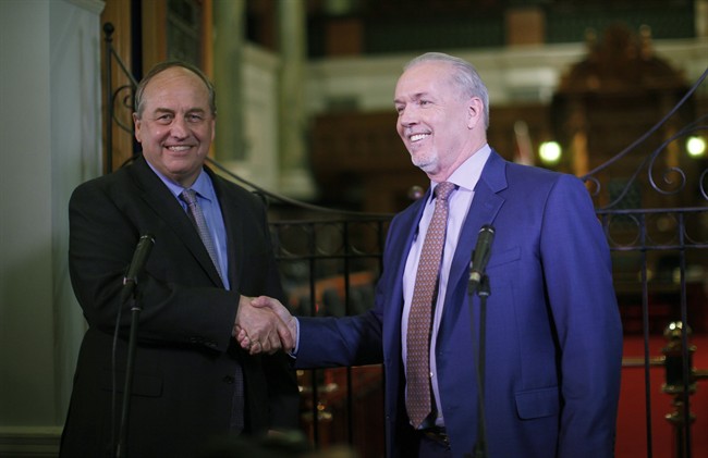 B.C. Green party leader Andrew Weaver and B.C. NDP leader John Horgan speak to media after announcing they'll be working together to help form a minority government during a press conference at Legislature in Victoria, B.C., on Monday, May 29, 2017.