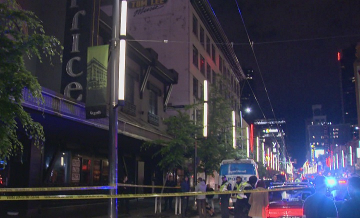 Police respond to a stabbing at the Caprice nightclub on Granville Street in May.