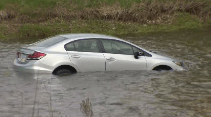 A man was charged in connection with a car found in the Credit River in Brampton Saturday. Jeremy Cohn/Global News.