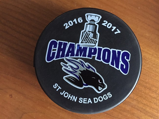 A hockey puck with the wrong spelling for Saint John Sea Dogs is shown in this handout photo. The Saint John Sea Dogs won't let a branding blunder at the Memorial Cup throw them off. They're used to them happening.