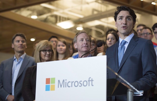 Prime Minister Justin Trudeau addresses a gathering during the opening of Microsoft's new location in Vancouver on June 17, 2016.