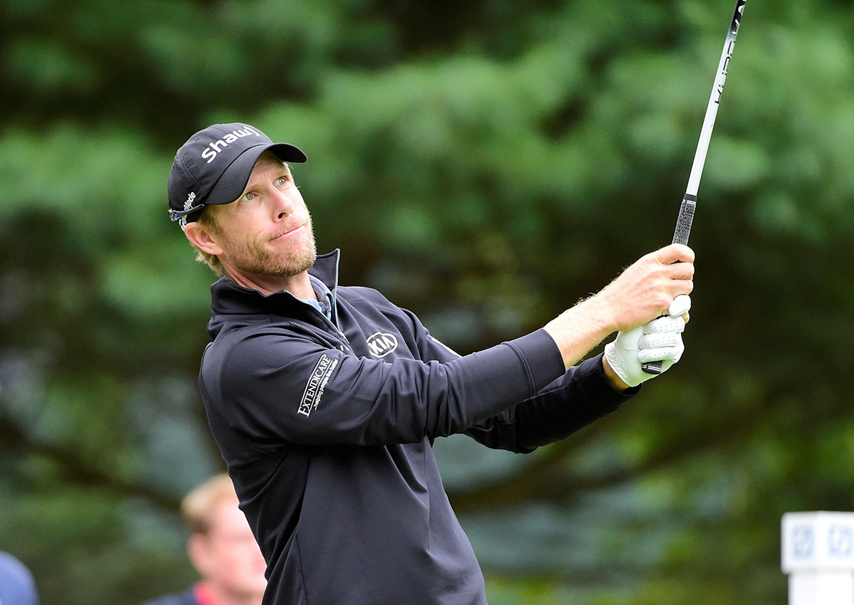 David Hearn of Canada watches the flight of his ball from the 6th tee box during the final round.
of the PGA Deutsche Bank Championship.