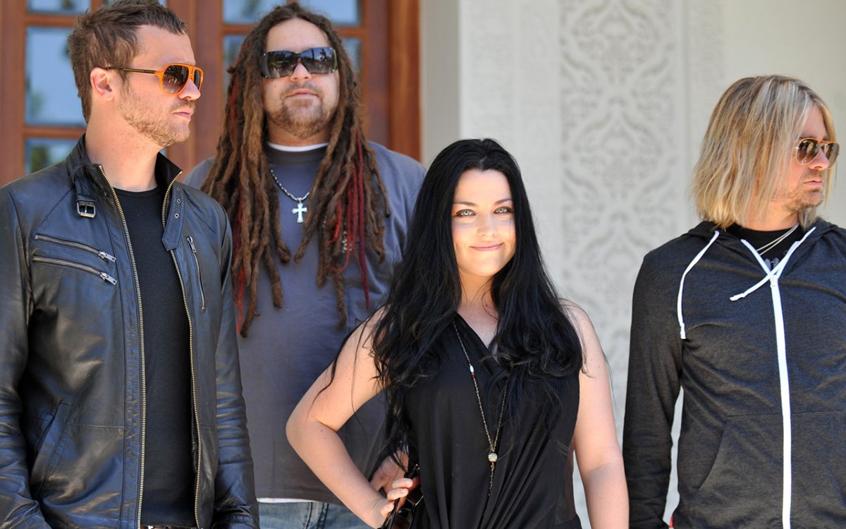 Amy Lynn Hartzler (2nd R), American singer-songwriter and  pianist with her rock band Evanescence  pose during a photocall  of  the Mawazine international music festival "World Rhythms" in Rabat on May 20 , 2012. 
