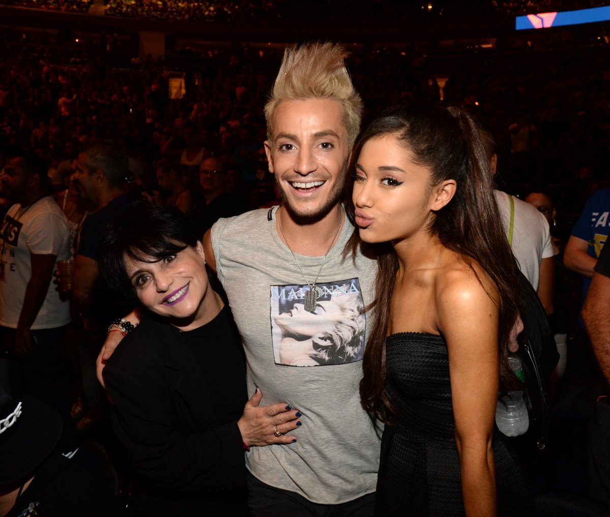 Joan Grande, Frankie J Grande and Ariana Grande pose before Madonna performs onstage.