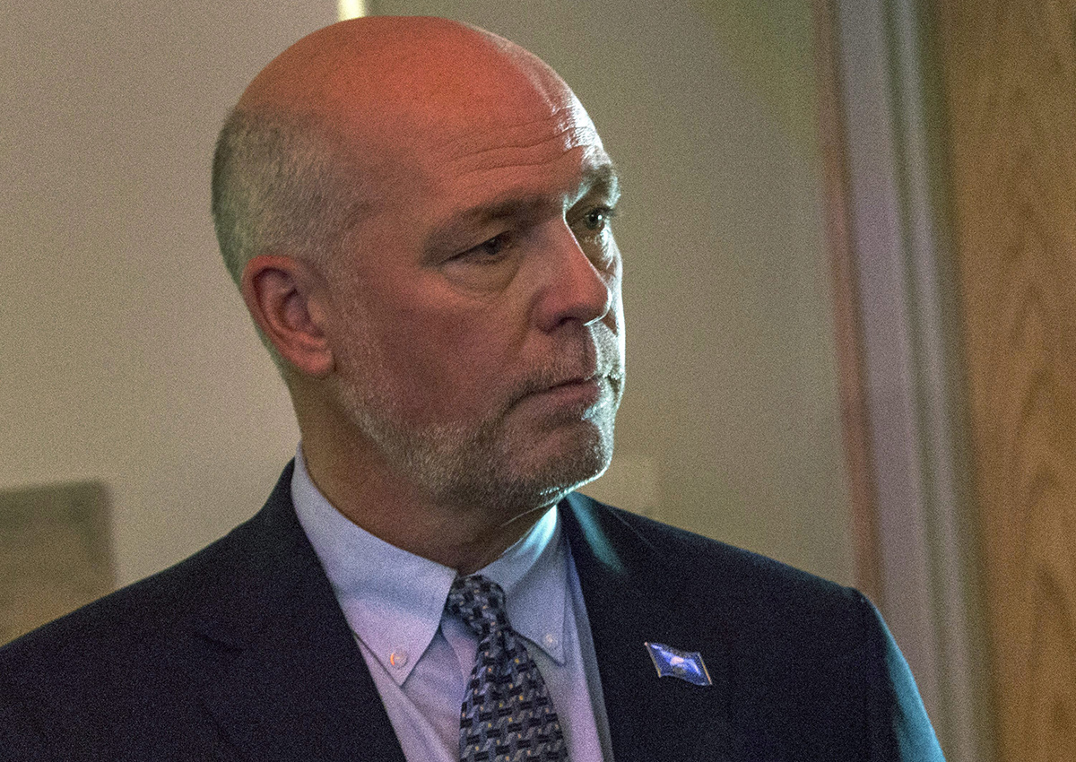  In this June 26, 2016 file photo, then-candidate for governor Republican Greg Gianforte speaks to a member of the audience after debating Montana Gov. Steve Bullock, in Big Sky, Mont.