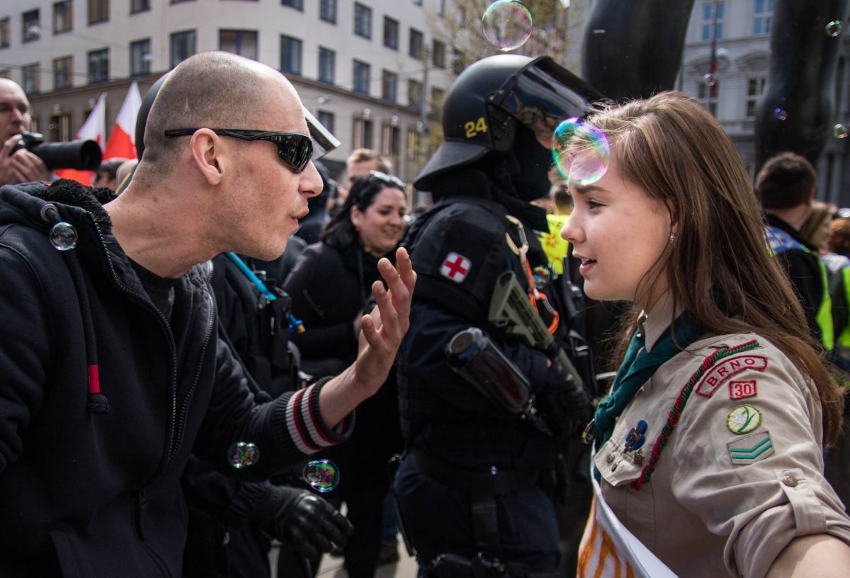 Teenage Girl Scout stands up to neo-Nazi in May Day rally - image