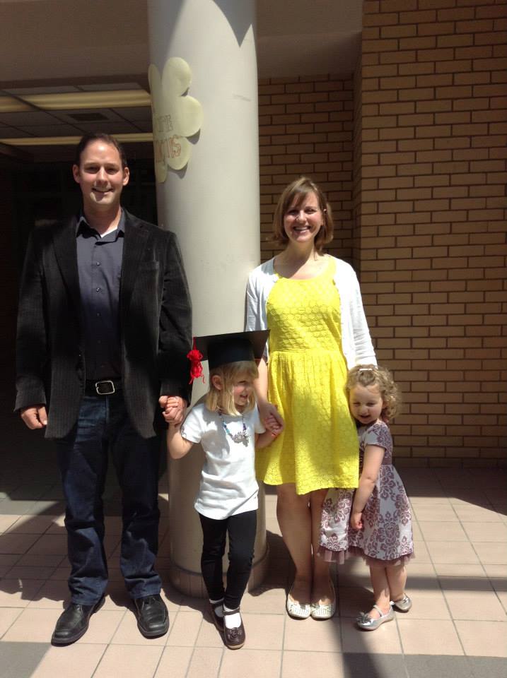 Tim Halman is seen with his wife, Ginette Thibault -Halman and their children are seen in this family photo.
