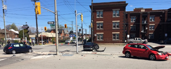 A Hamilton police officer is one of three people in hospital after a crash at Main and Wentworth.
