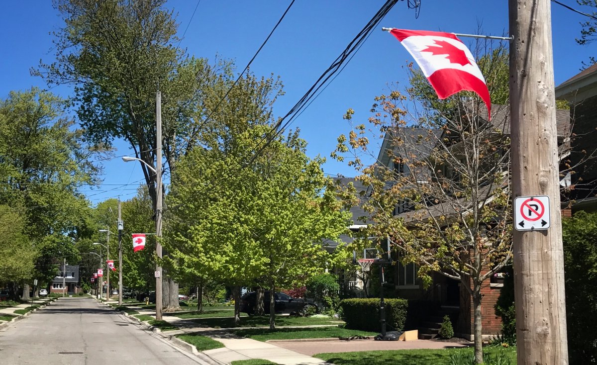 Canadian flags line Thornton Avenue in Old North on May 15, 2017.