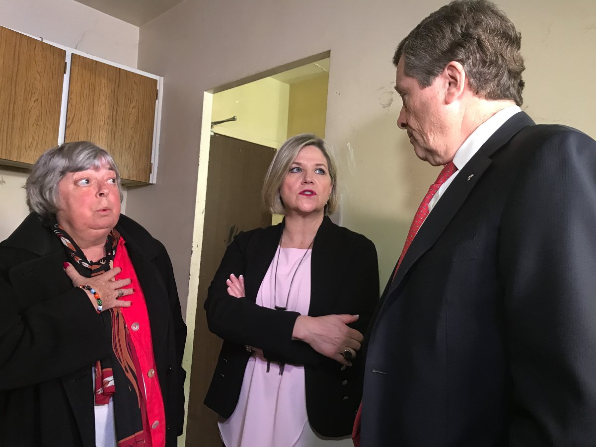 Ontario NDP Leader Andrea Horwath (centre), Toronto Mayor John Tory (right), and Toronto city councillor Pam McConnell (left), tour a Toronto Community Housing building on Bleecker Street on May 8, 2017. 
