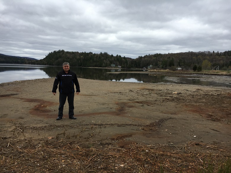 Yvon Blanchard, director-general of the municipality of Lac-Sainte-Marie, stands on the lake bed on May 9, 2017.