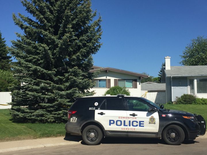 An Edmonton police vehicle is parked outside a north end home where police investigate the suspicious death of a six-month-old boy, Sunday, May 28, 2017.