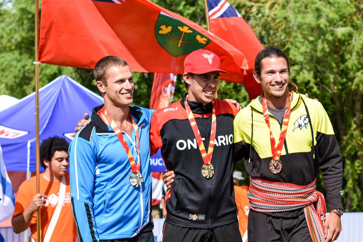 James Lavallée proudly takes the podium after finishing third in the kayak 500-metre final today. Photo Supplied by Canada Summer Games. 
