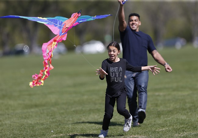 Winnipeg Blue Bomber Andrew Harris and his daughter Hazel fly a kite at Assiniboine Park in Winnipeg, Saturday, May 13, 2017. Harris is at a good place in his life personally and professionally since he came back to Winnipeg a year ago. A big reason for that is spending more time with his nine-year-old daughter, Hazel.