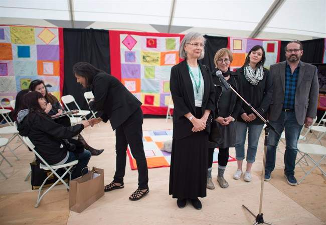 Commissioners, right to left, Brian Eyolfson, Qajaq Robinson, Marilyn Poitas, Chief Commissioner Marion Buller and Michele Audette are seen during media availability at the National Inquiry into Missing and Murdered Indigenous Women and Girls taking place in Whitehorse, Yukon, on Monday, May 29, 2017. THE CANADIAN PRESS/Jonathan Hayward.