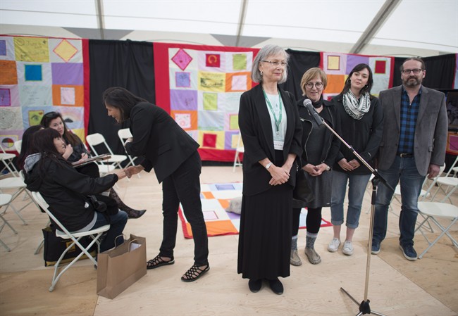 Commissioners, right to left, Brian Eyolfson, Qajaq Robinson, Marilyn Poitas, Chief Commissioner Marion Buller and Michele Audette are seen during media availability at the National Inquiry into Missing and Murdered Indigenous Women and Girls taking place in Whitehorse, Yukon, on Monday, May 29, 2017. THE CANADIAN PRESS/Jonathan Hayward.