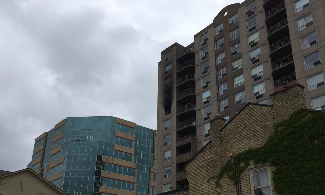 Damage was mostly contained to a single 10th floor unit at 155 Kent. St, but flames ventilated from a window and damaged some exterior. 