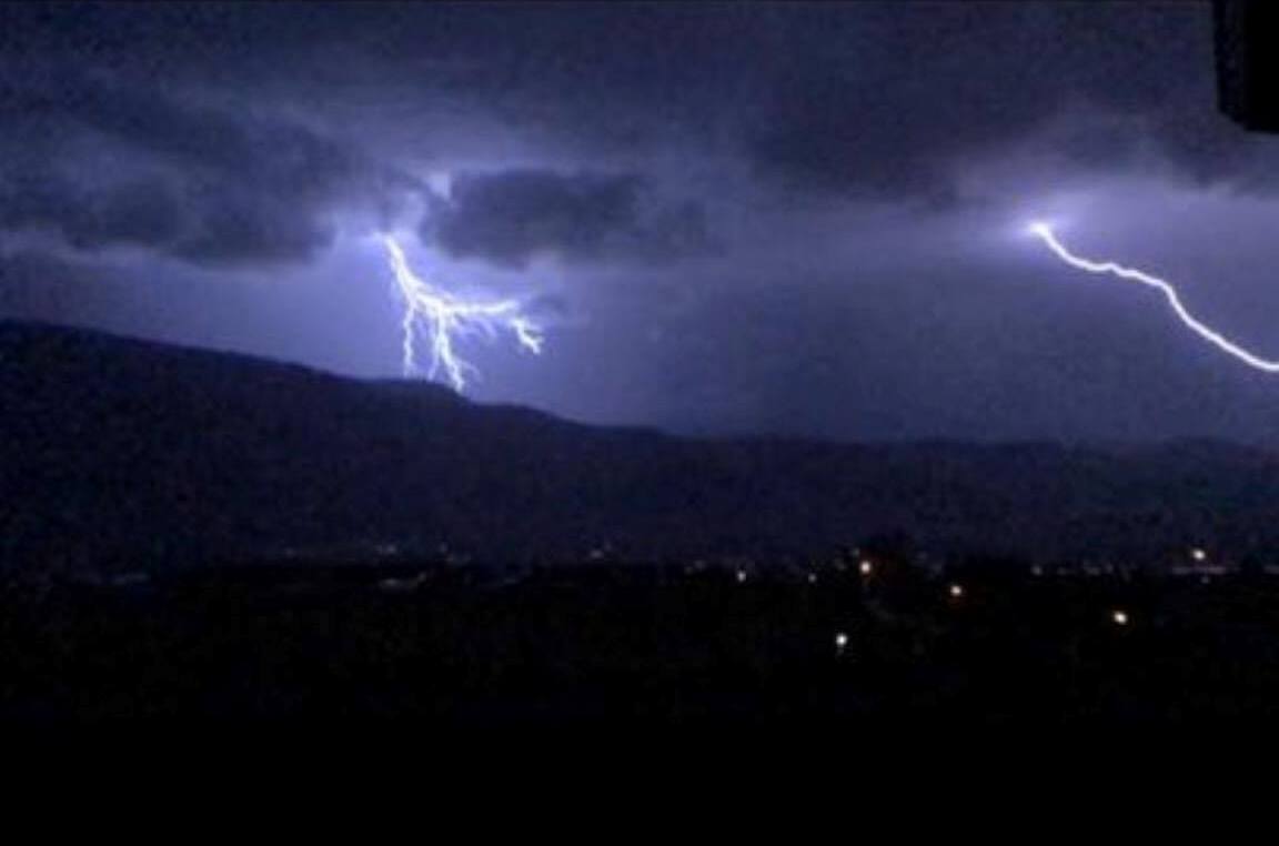 Cloud to ground lightning strike.