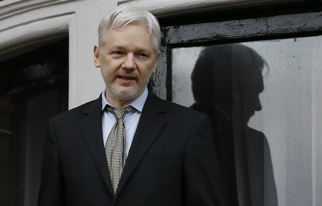 WikiLeaks founder Julian Assange speaks from the balcony of the Ecuadorean Embassy in London. 