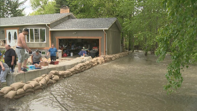 New evacuation alerts have been issued in Lumby, where flooding continues since the waters of local creeks have been rising all month. Here, a Lumby home began building sandbag walls May 12 to protect from flooding.