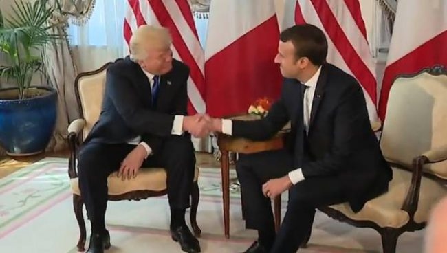President Donald Trump shakes hands with French President Emmanuel Macron during a meeting at the U.S. Embassy in Brussels, May 27, 2017.