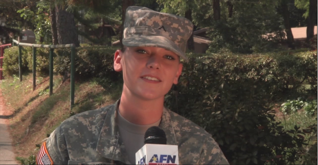 A screenshot from an American Forces Network video of former Pte. Rollins sending a holiday greeting to her hometown of Windham, Maine from her station in Dongducheon, South Korea in 2014.