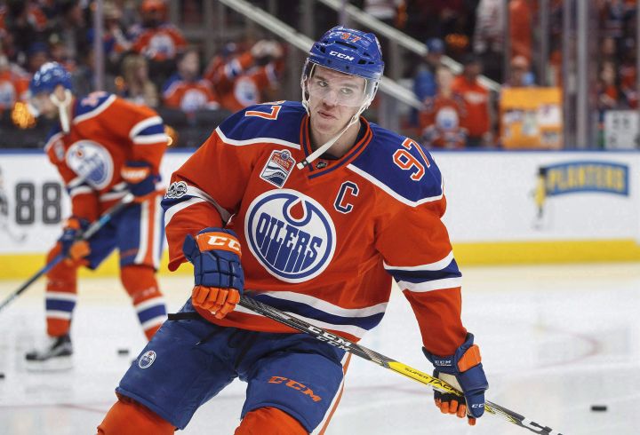 Edmonton Oilers' Connor McDavid (97) takes part in warm up before taking on the San Jose Sharks during NHL playoff action in Edmonton, Alta., on Friday April 14, 2017. The Edmonton Oilers beefed up their top line Tuesday as they prepared for a second round NHL series against the Anaheim Ducks, a series that centre Connor McDavid says will feature more hits, bodychecks, bruises, and ice packs. 