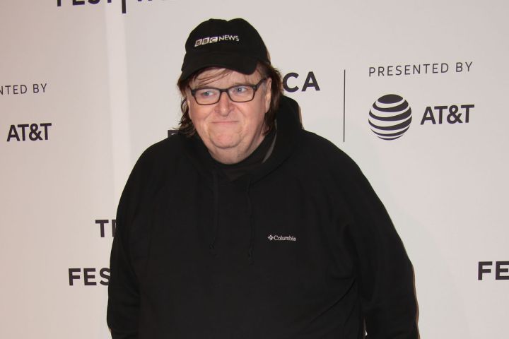 Michael Moore is reuniting with producers Harvey and Bob Weinstein for 'Fahrenheit 11/9.'.