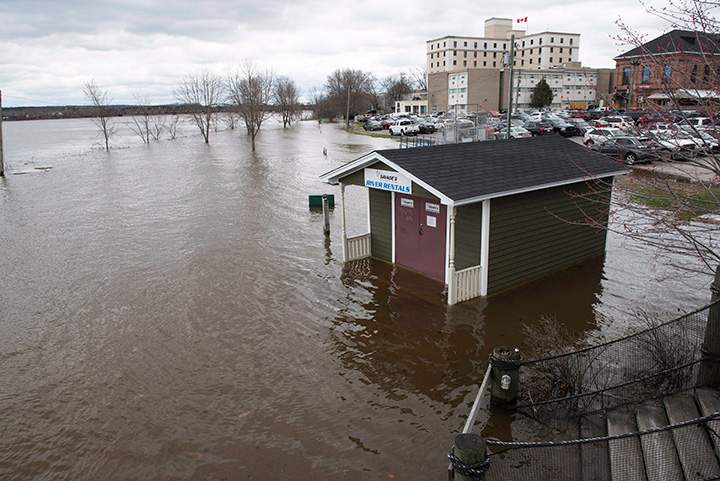 Items like this building on the green in downtown Fredericton are surrounded or covered by water as the St. John River is above flood stage in Fredericton, N.B., on Wednesday, May 5, 2017.