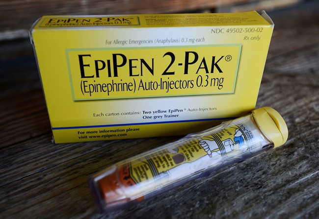 FILE - This Oct. 10, 2013, file photo, shows an EpiPen epinephrine auto-injector, a Mylan product, in Hendersonville, Texas. 