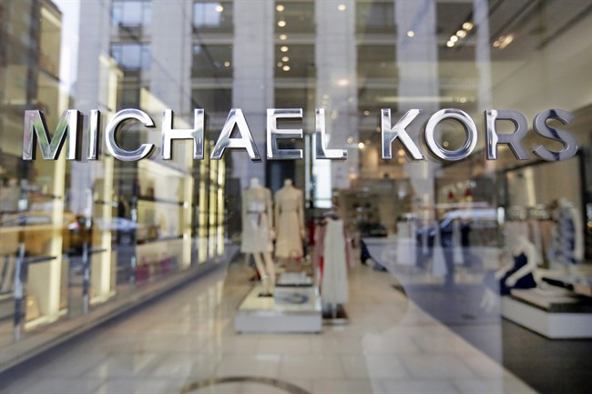 The Michael Kors name adorns his store on Madison Avenue, in New York, Wednesday, May 31, 2017.