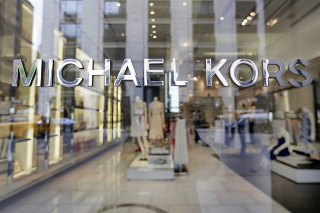 The Michael Kors name adorns his store on Madison Avenue, in New York, Wednesday, May 31, 2017.