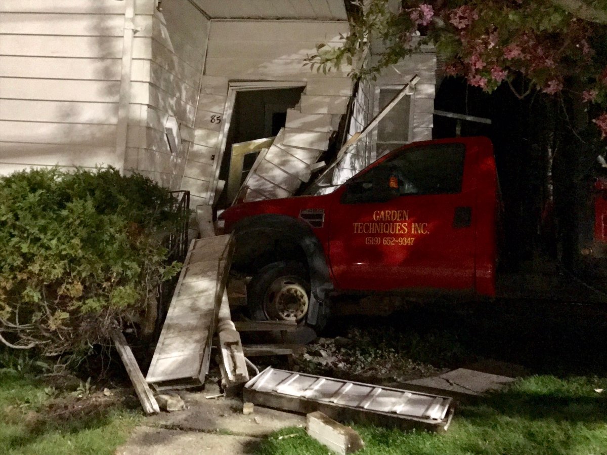 A truck crashed into a house on Oxford Street in London, Ont. on May 3, 2017.