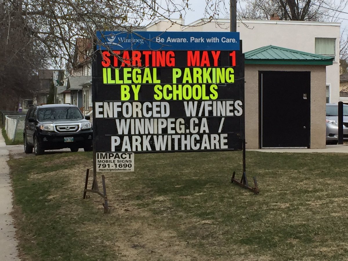 A City of Winnipeg sign advertising parking campaign.