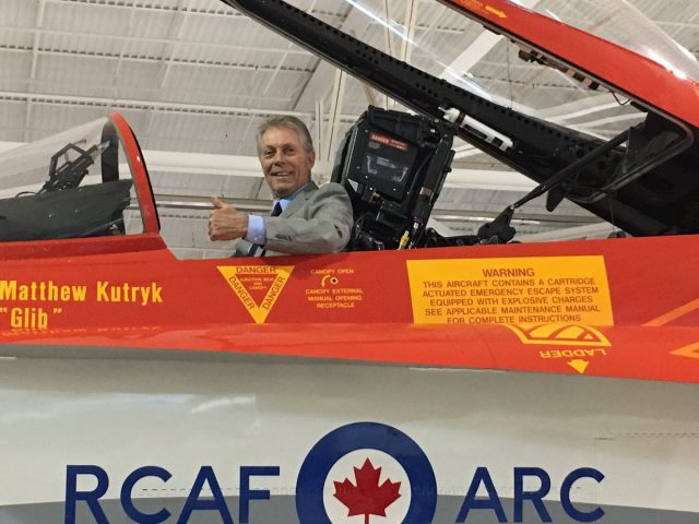 Hamilton Mayor Fred Eisenberger takes a seat in a CF-18, to help launch Canada 150 Hamilton celebrations at the Canadian Warplane Heritage Museum.