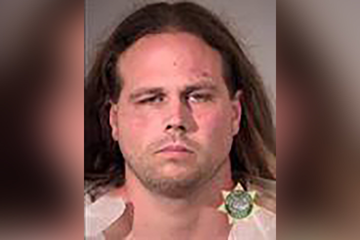 This booking photo provided by Multnomah County Sheriff’s Office shows Jeremy Joseph Christian. Authorities on Saturday, May 27, 2017 identified Christian as the suspect in the fatal stabbing of two people on a Portland light-rail train in Oregon.