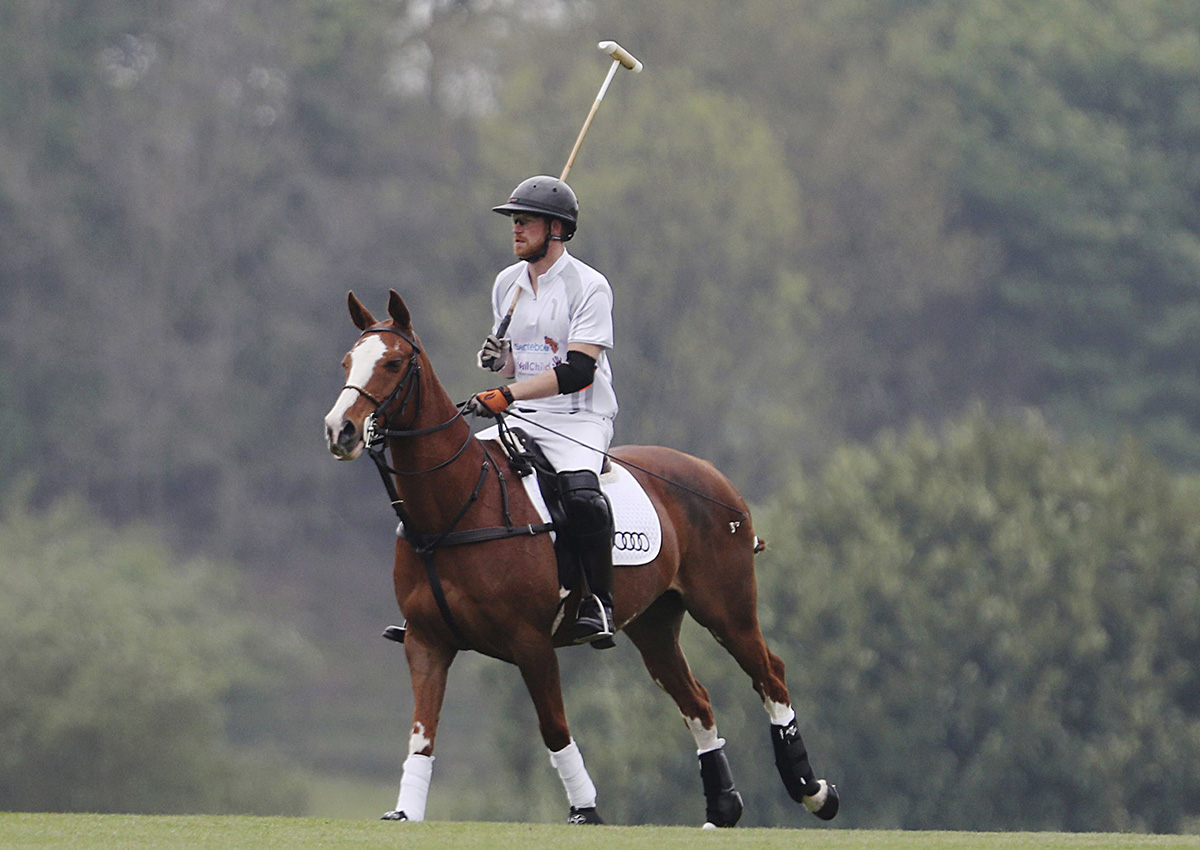 In this Saturday, May 6, 2017 photo, Britain\’s Prince Harry takes part in the annual Audi Polo Challenge at Coworth Park polo club in Ascot, England.