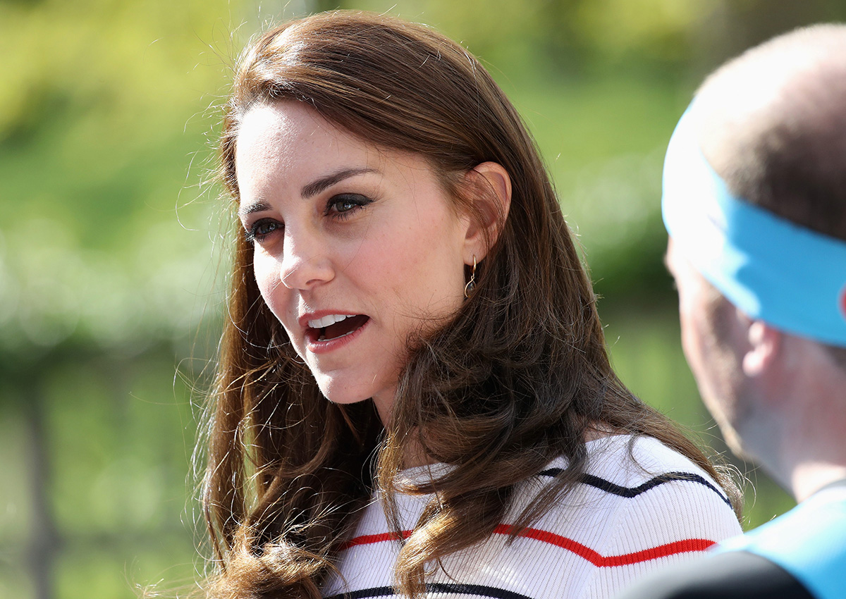 Catherine Duchess of Cambridge speaks with runners from Team Heads Together ahead of the 2017 Virgin Money London Marathon.
